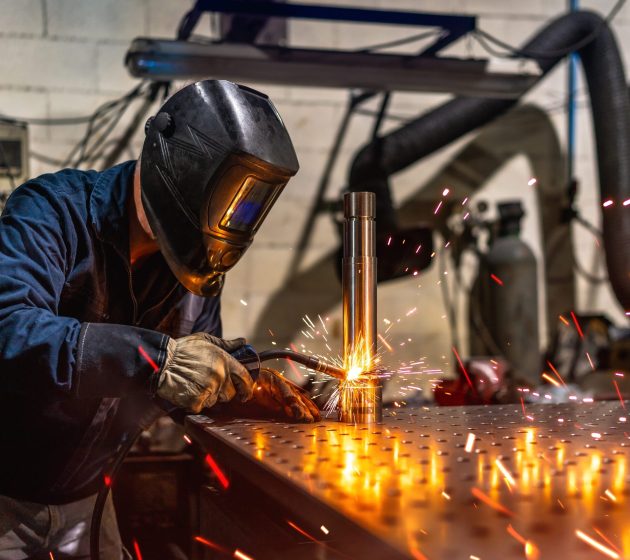 welder-welding-a-piece-of-metal-in-a-factory-2026-01-06-10-17-41-utc